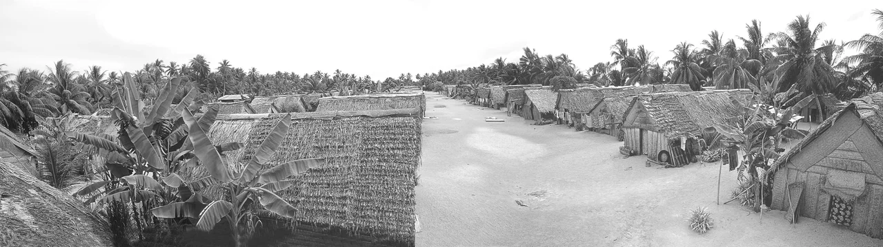 Nukutoa village, Takuu Atoll, Papua New Guinea, in the year 2000. A village scene on a Polynesian outlier island.