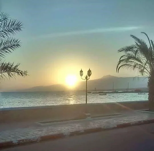 A photo of Tadjoura beach at sunset.