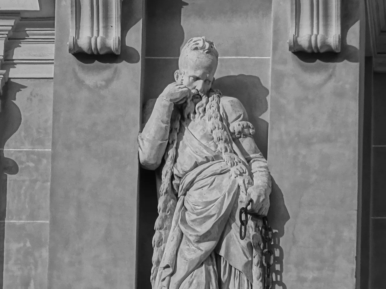 Detail of one of the statues of Palace of the Doge's facade
