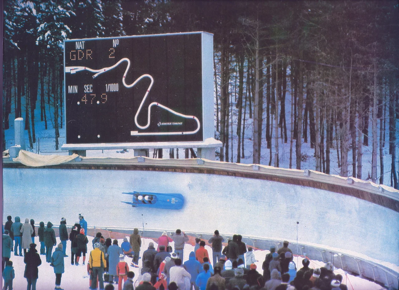 The German Democratic Republic four-man bobsled number 2 sled races through the final curve 13 during the 1983 European Bobsleigh Championships at the Mt. Trebevic Bobsleigh & Luge Track.