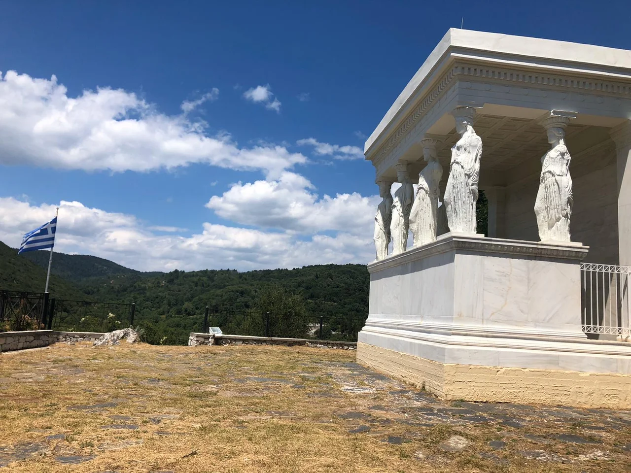 This is a side view of the Caryatid monument which is located in Karyes, Laconia. It is a replica of the Caryatids of the Erectheion of the Parthenon.