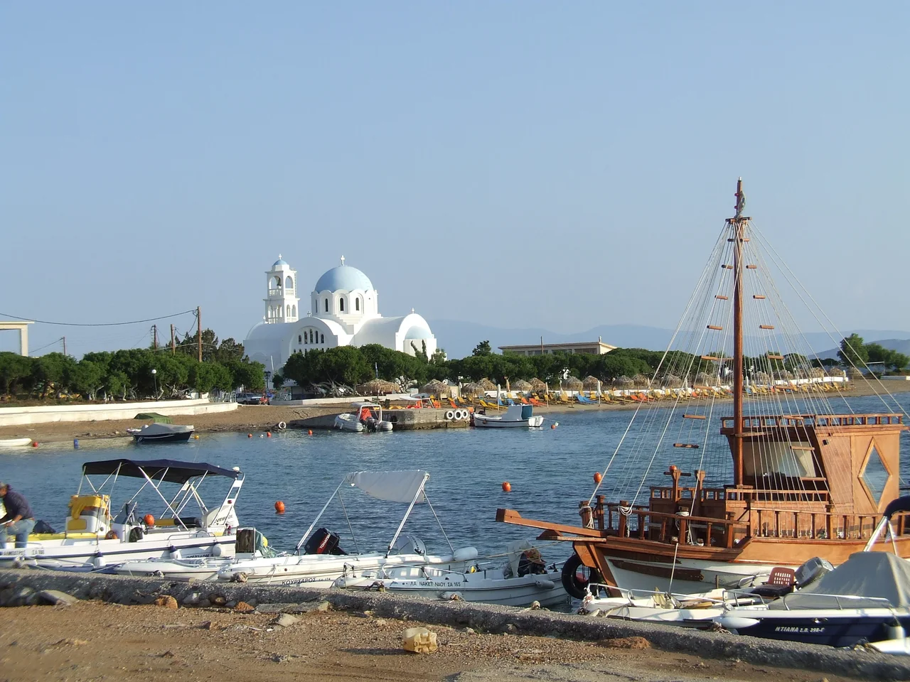 The Church of Agii Anargyri from the beach located near the small port town of Skala (SkalaΣκαλα Αγκιστριουunstarred) on the island of Agistri (Αγκιστρι), Greece.