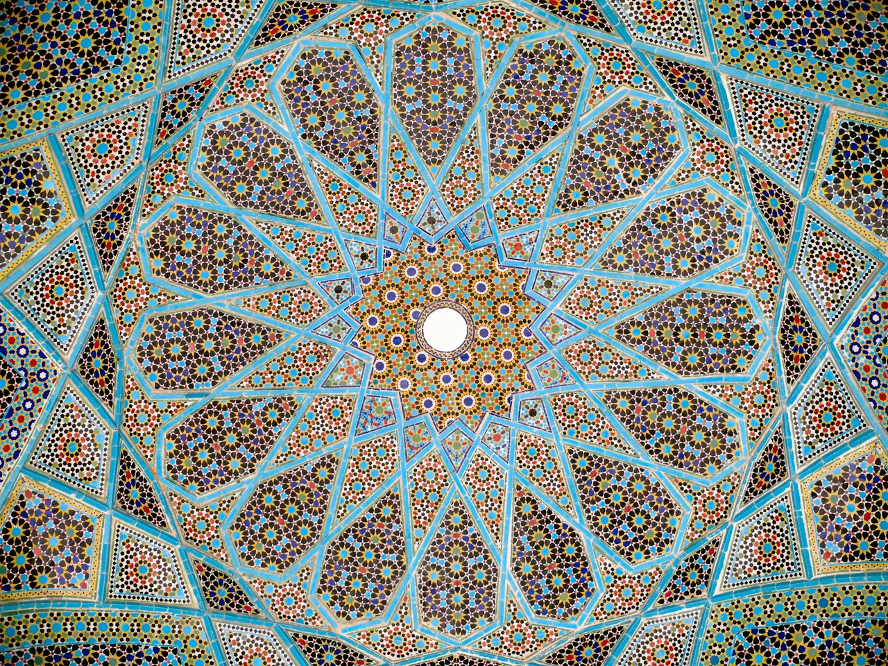 Iranian glazed ceramic tile work, from the ceiling of the Tomb of Hafez in Shiraz, Iran. Province of Fars.