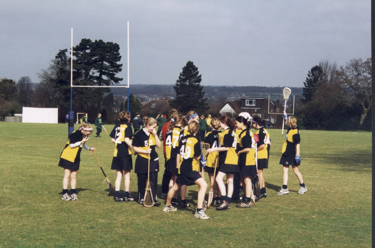 Photo taken of the Benenden Lacrosse team at Milton Keynes (National School's Lacrosse tournament in Berkhamstead, 2000 by Anya Nixon