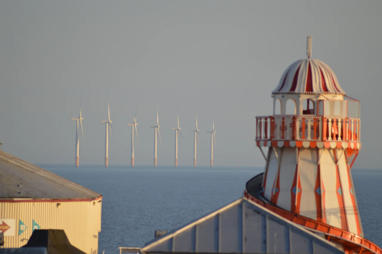 Clacton Pier, outdoor amusements and rides in early evening. The 75-year-old helter-skelter collapsed in a storm later in the month on 28 October 2013.[1]