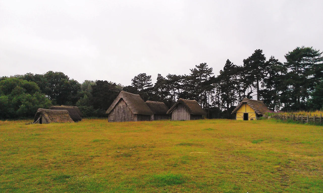 A panorama of West Stow Anglo-Saxon village, a series of timber reconstructions using materials that would have been available in Anglo-Saxon England. Photographed in summer 2012.