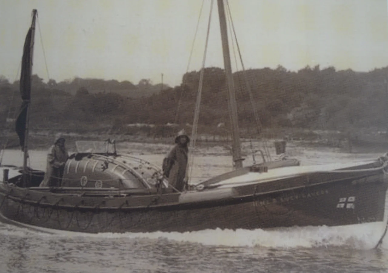 Photograph of an image display at the Rescue Wooden Boats Visitor Center in Stiffkey in North Norfolk. The image is of the Lucy Lavers (ON 832) Lifeboat at sea. The lifeboat is currently undergoing full restoration there (August 2013).
