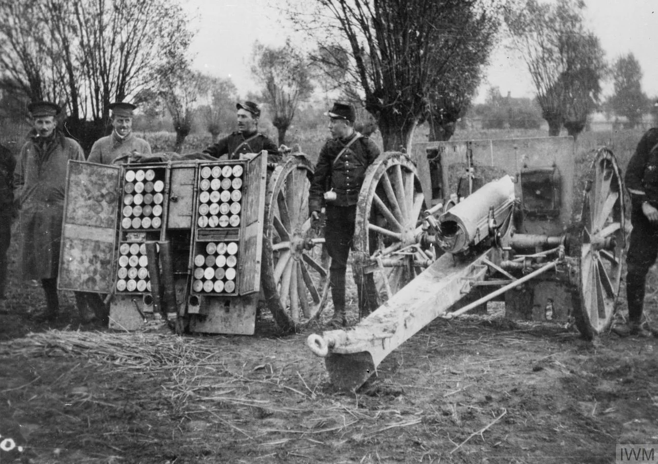 IWM caption : "Two officers (Davidson, M. O., and Churchill) of the 1st Cameronians by a 75 mm. French Field Gun and ammunition waggon at Bas Maisnil".