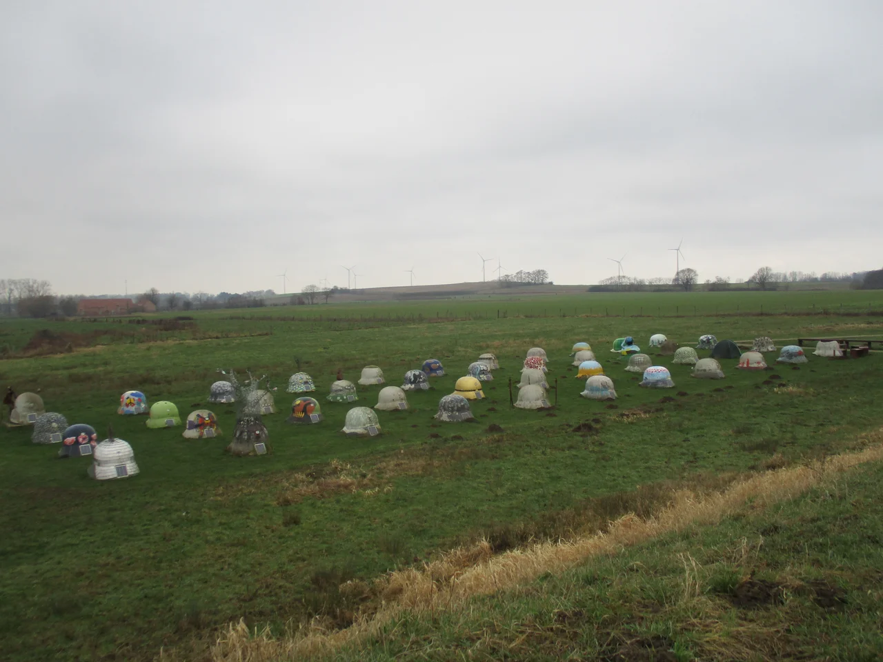 44 helmets that symbolize the German occupation of Limburg, Belgium