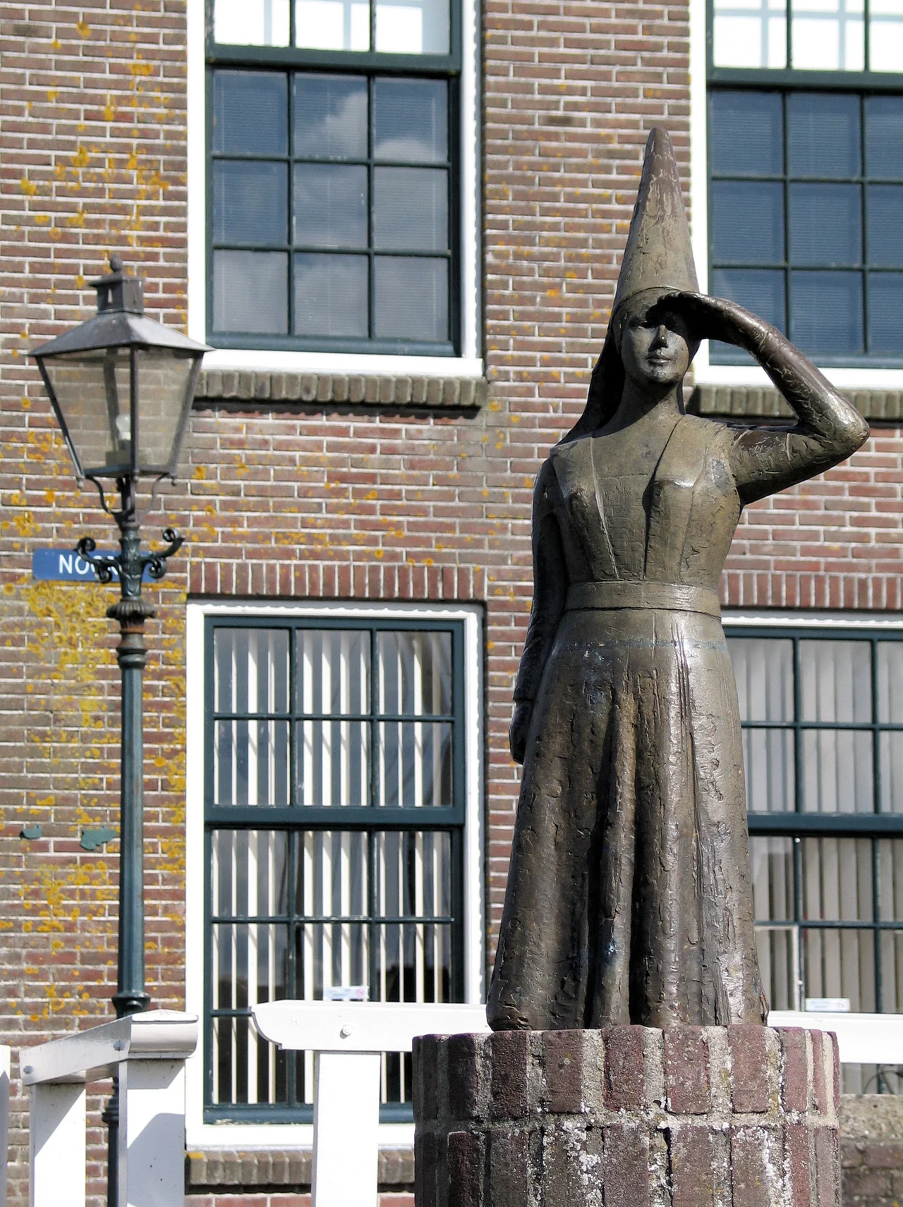 Statue of the "Lady of Stavoren" in the harbour of Stavoren, The Netherlands.