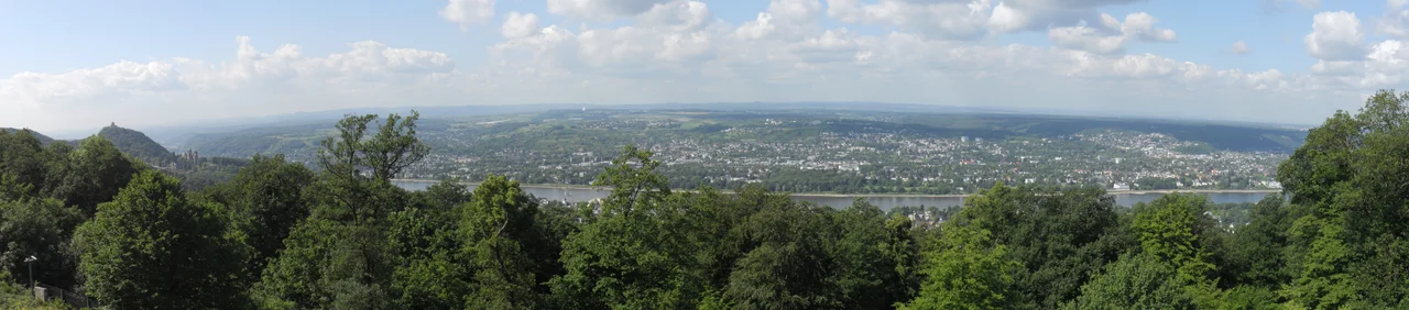 Drachenfels mountain with two castles on it: Schloss Drachenburg and Burg Drachenfels. View from Bonn Mehlem.