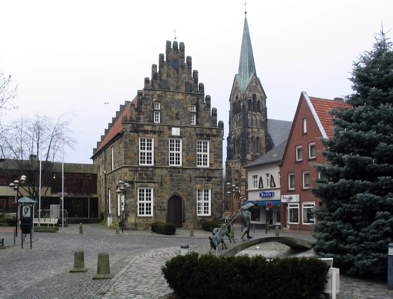 Marketplace of Schüttorf with font, city hall and catholic church