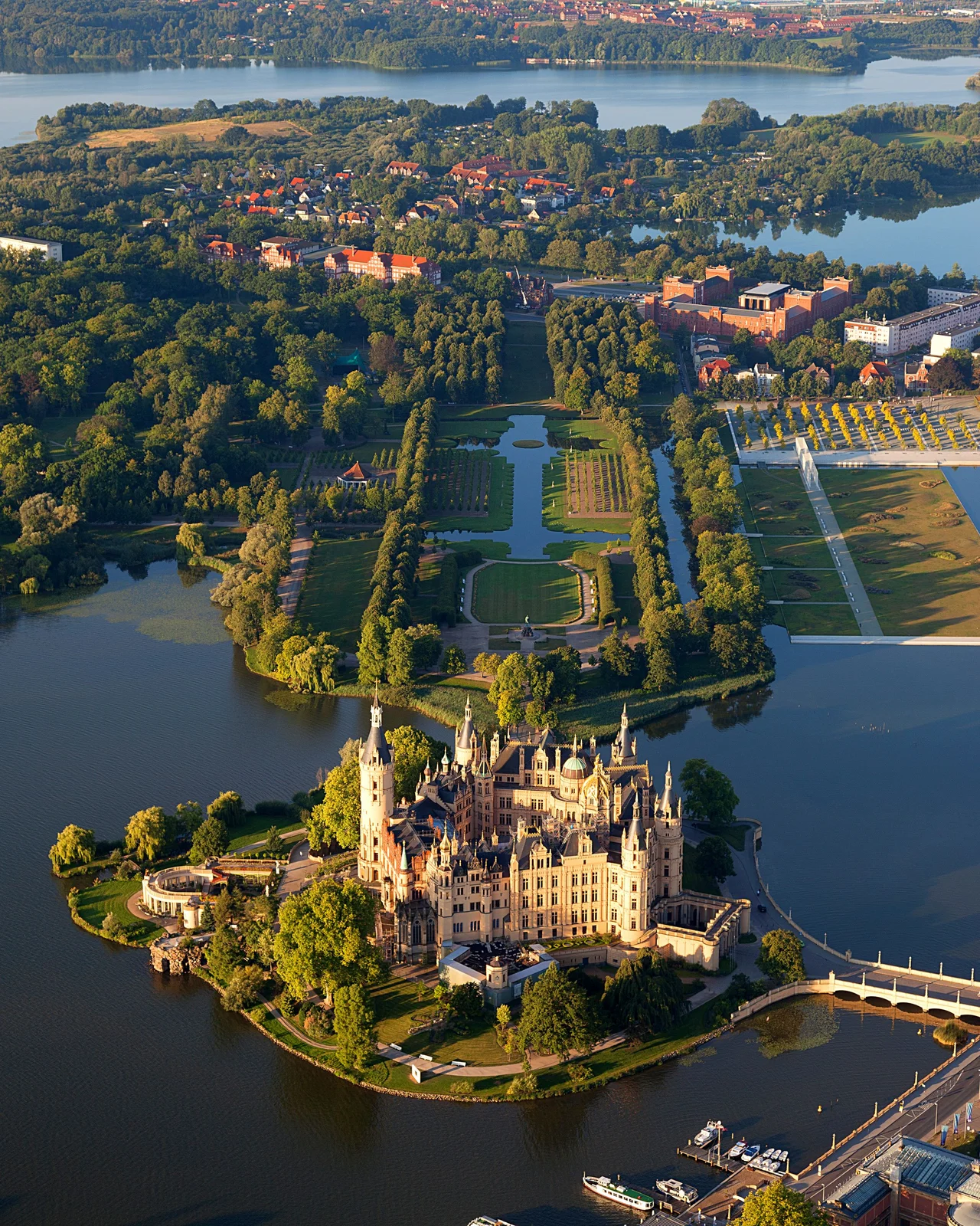 Schwerin Palace on its island at Lake Schwerin, aerial view