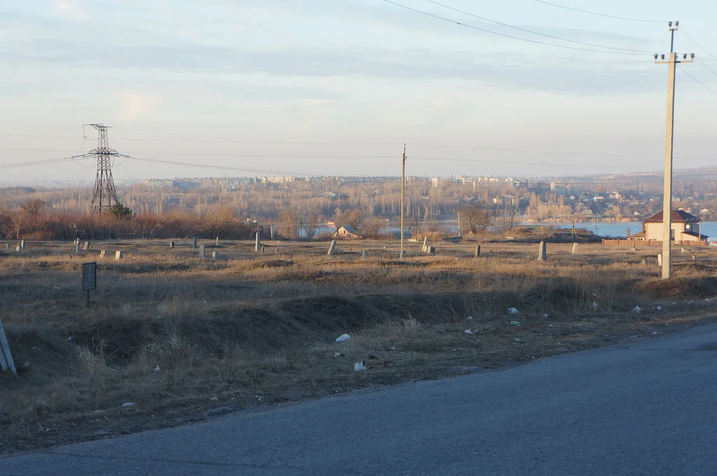 Old cemetery in Stari Kodaky, near the site of Kodak Fortress. Dnipro river is in the background.