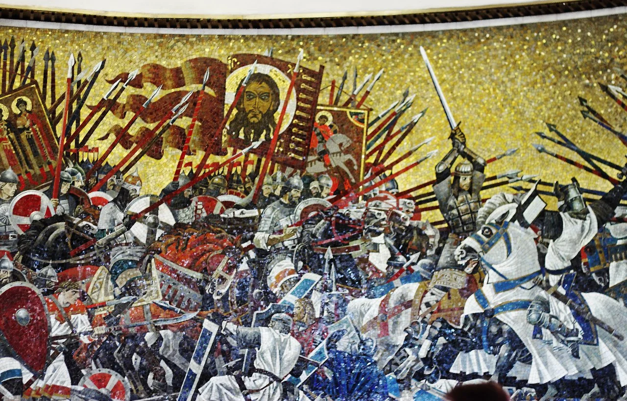 мозаичное панно «Ледовое побоище», выполненное по эскизу художника А. К. Быстрова.
А.К.Быстров. Ледовое побоище. Мозаика на станции метро «Площадь Александра Невского» в Ленинграде. 1985