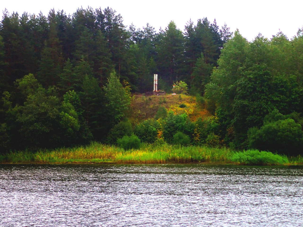 The site of general Ivan Fedyuninsky's command post on the east bank of Narva River in Tõrvala village, Estonia 1944 (now in Leningrad oblast, Russia). View from the west bank in Estonia.