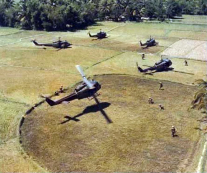 U.S. Army Bell UH–1D Huey helicopters pick up soldiers of the 1st Cavalry Division during operations on the Bong Son Plain, Vietnam, in 1966.